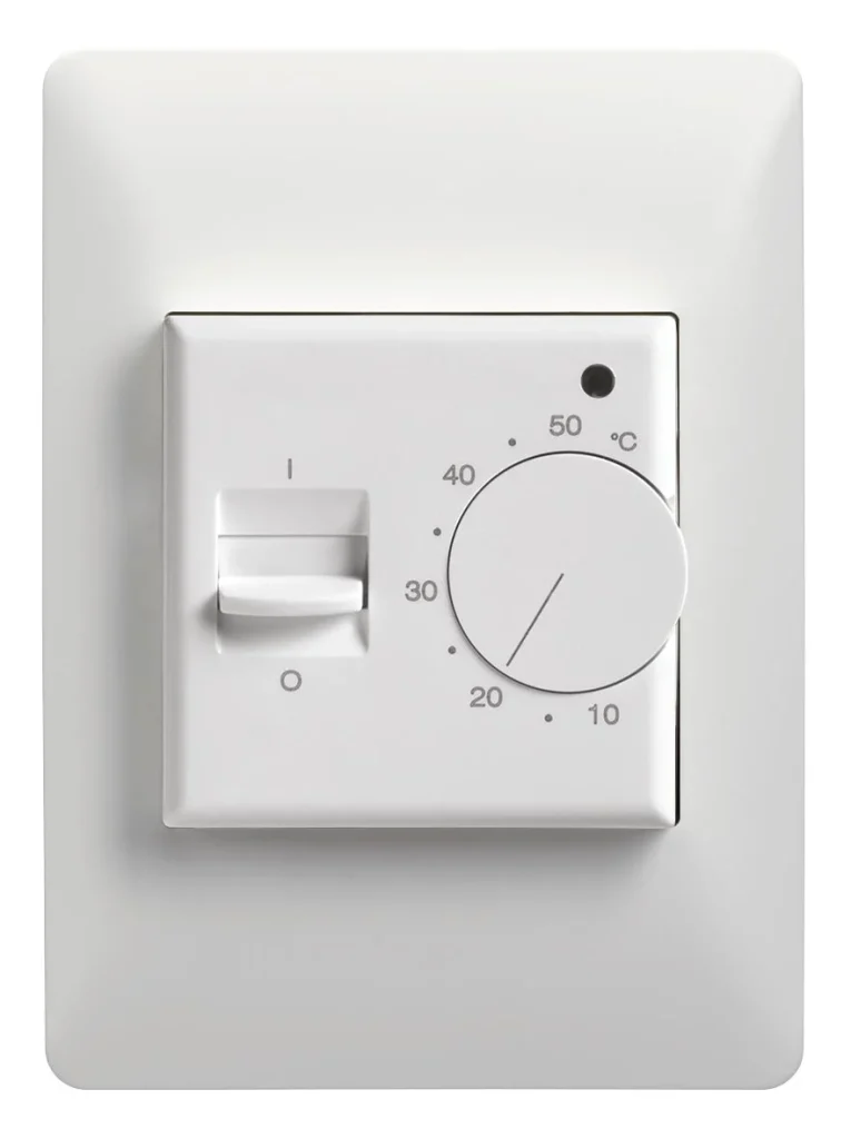 straight view of the analogue manual thermostat with dial to adjust temperature